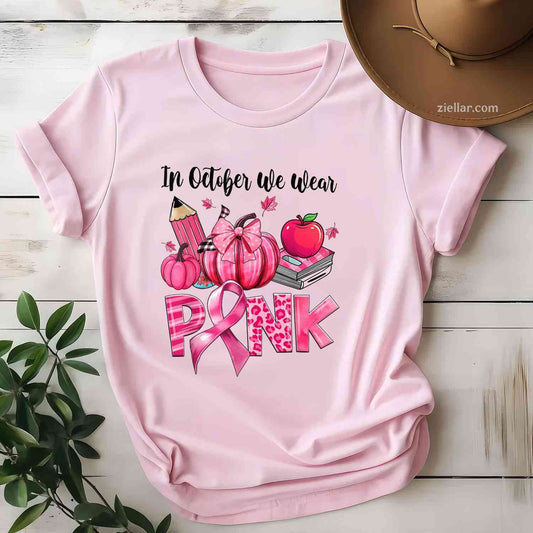 In October We Wear Pink Apple Teacher Pumpkin Breast Cancer Funny Graphic Tee and T-Shirt Gift for Adults Men Women Unisex