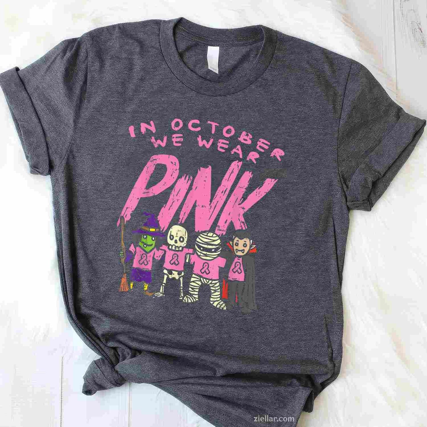 October We Wear Pink Witch Skeleton Halloween Breast Cancer Funny Graphic Tee and T-Shirt Gift for Adults Men Women Unisex