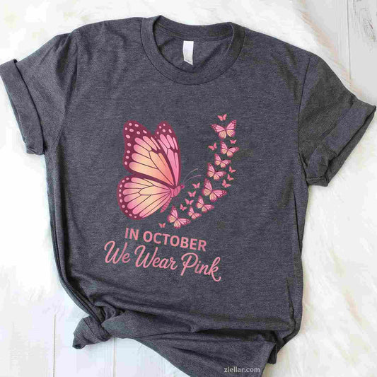 in October We Wear Pink Breast Cancer Awareness Butterfly Funny Graphic Tee and T-Shirt Gift for Adults Men Women Unisex