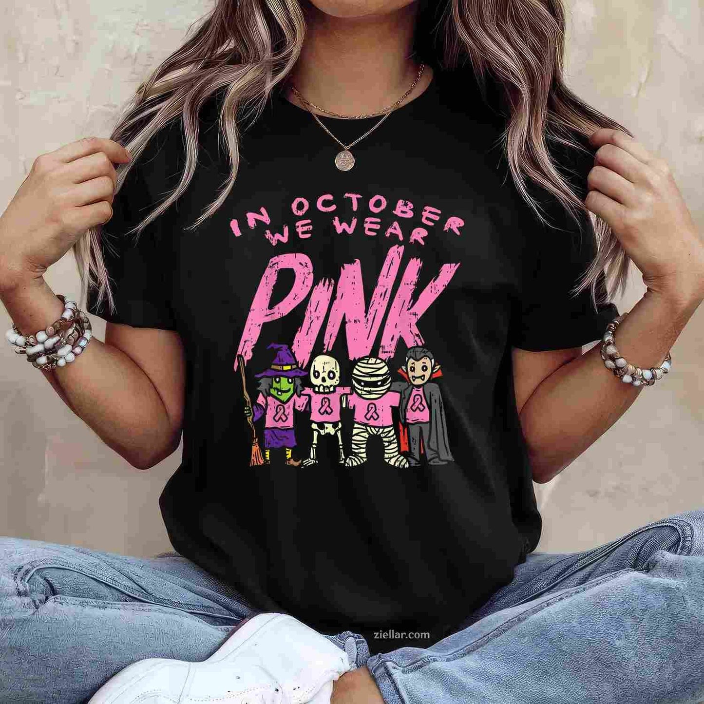 October We Wear Pink Witch Skeleton Halloween Breast Cancer Funny Graphic Tee and T-Shirt Gift for Adults Men Women Unisex